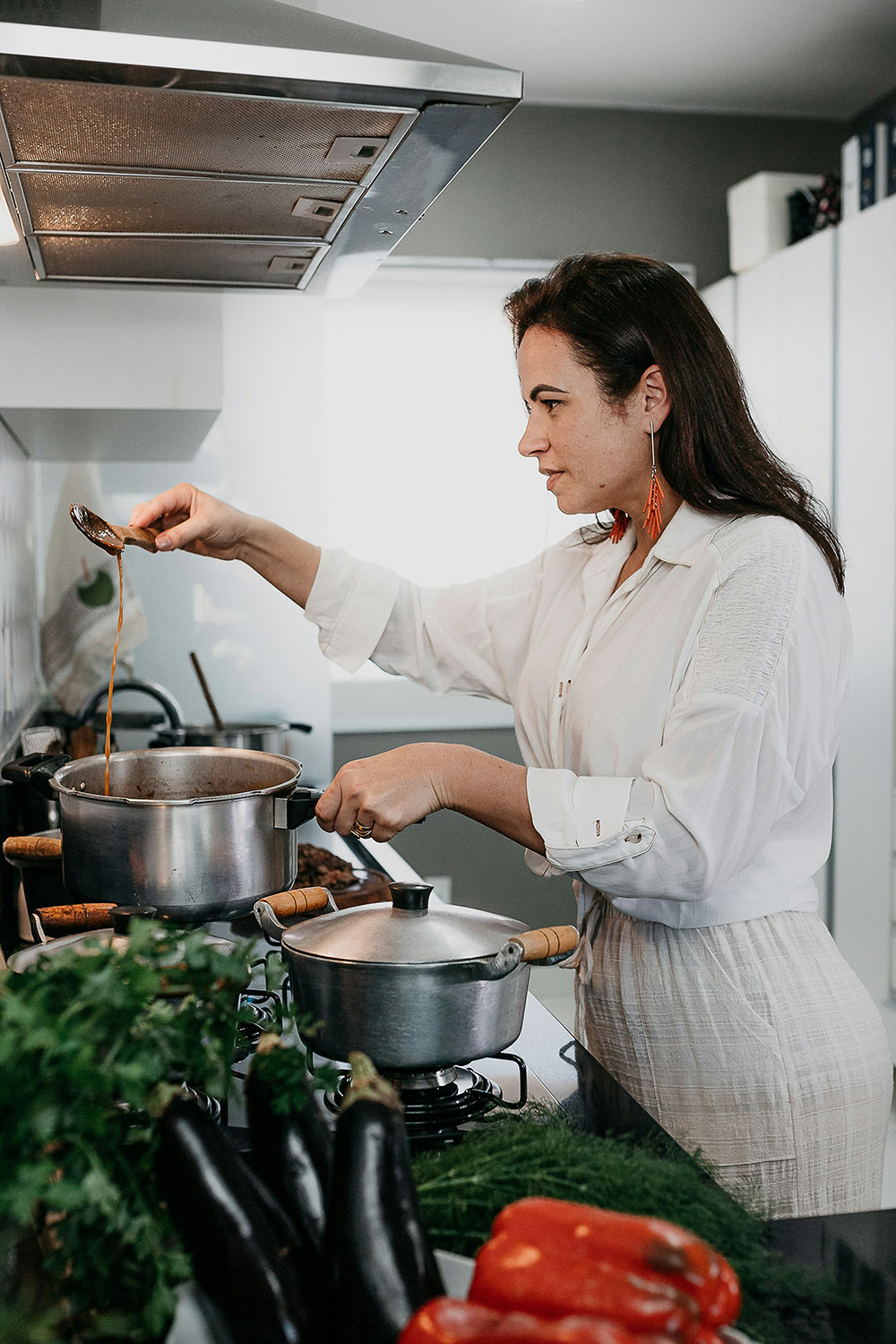 woman cooking in post about insulin resistance and pcos