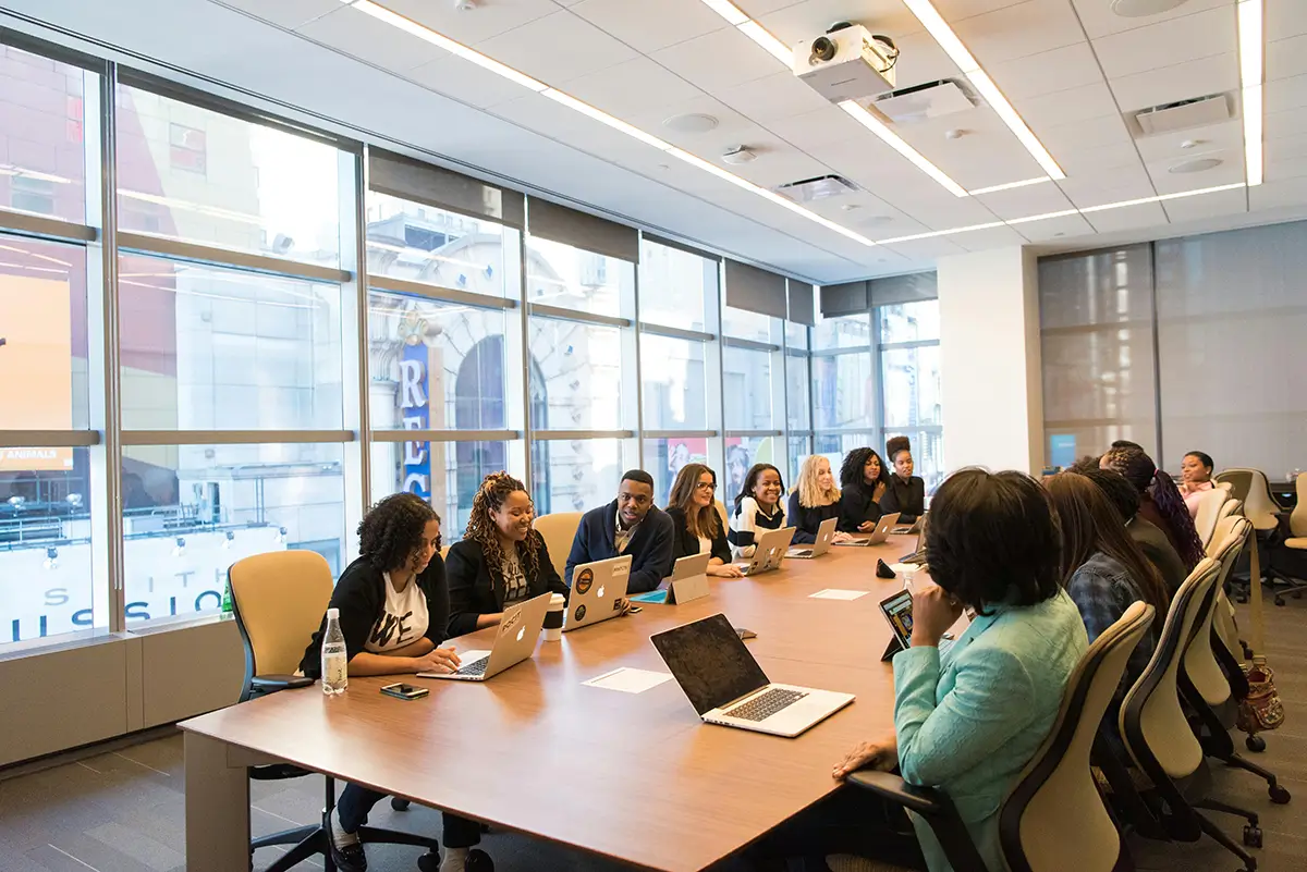 people around conference table for diabetes digital employee wellness program