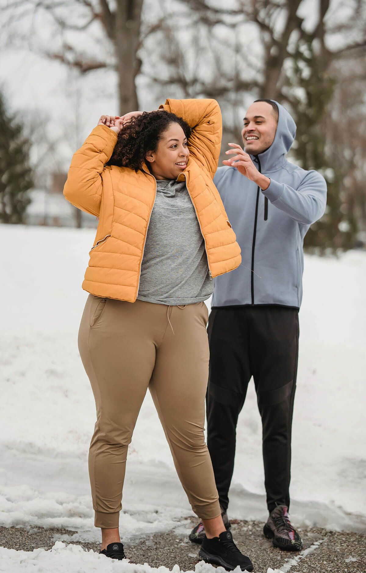 woman with PCOS walking with her partner after a meal to combat insulin resistance