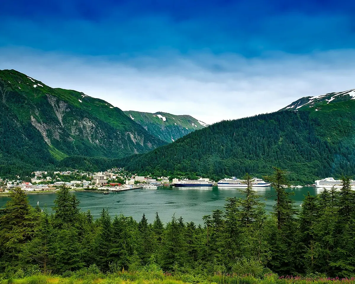 blue sky and mountains over lake in Juneau for page about registered dietitians in Alaska