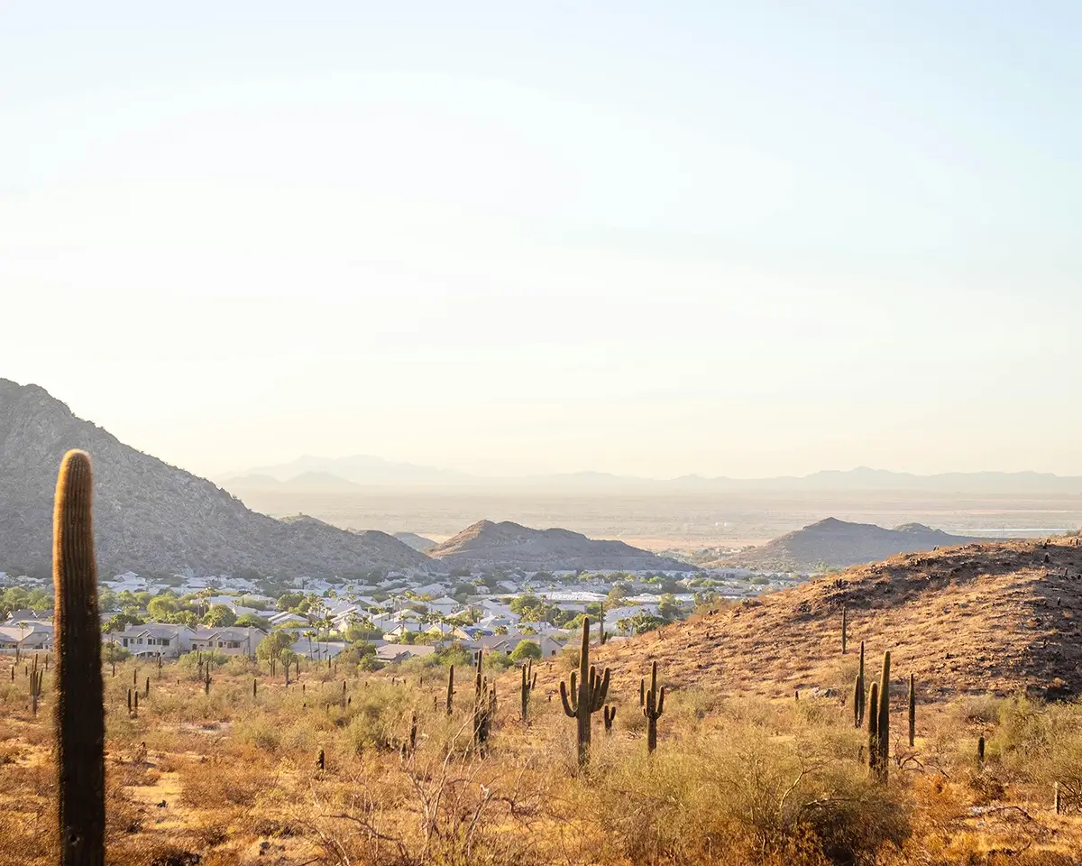 landscape photo of hills and city below phoenix az for page about dietitians in arizona